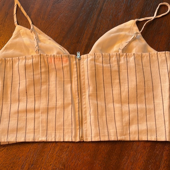 Crop top. White with black pin stripes. Tie front. Zipper back. Medium - Picture 3 of 4
